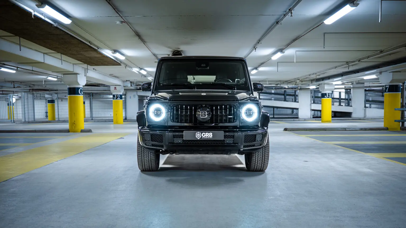 a black car with lights on